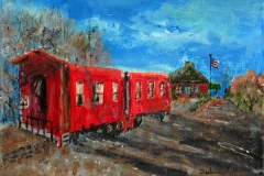 Three red cabooses and the SASi train depot.
