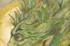 Horned green man with leaved face and pointed ears.