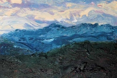 Mountain scene under a swirling blue and lavender sky.