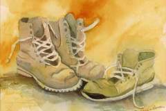 8 - three weel-used work boots, untied after use