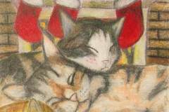 16 - two cats and a kitten sleeping near a fire with red stockings hung for the holidays
