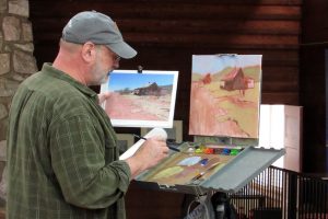 Todd Baxter painting at easel