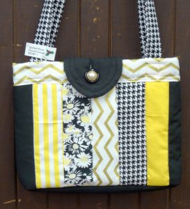black and yellow quilted purse by artist Dianne Garner