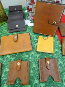 6 leather wallets by artist WT Tarapchak