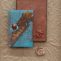 clay, rust work by Janet Littlejohn Kaufman