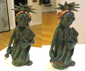 2 views of a clay sculpture of a grieving statue of liberty by artist Janet Sims.