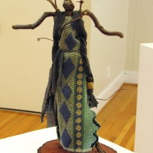 twig and fabric female figure sculpture by artist Crystal Whitesides.