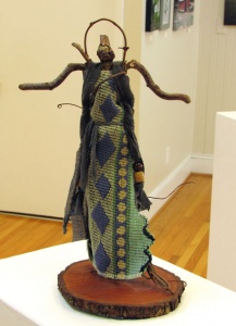 twig and fabric female figure sculpture by artist Crystal Whitesides.