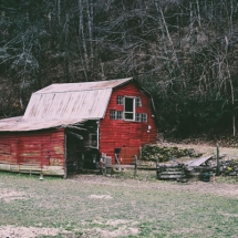 old red barn photographed in color by photographer Robert Webb.