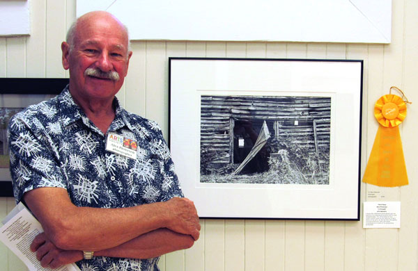 Photographer Alex Pietersen wines third place for his photo of barn "Unhinged".