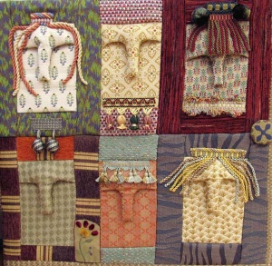 Detail of patchwork fabric panel with faces by artist Anna Dlougolendaia.