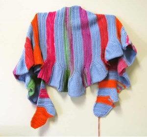 Woven periwinkle, magenta and orange striped and flared shawl by artist Chris Dunlap.