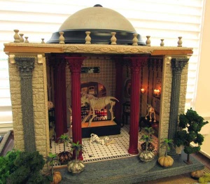 45a miniature room sculpture of museum room with tiled floor displaying animal skeletons.