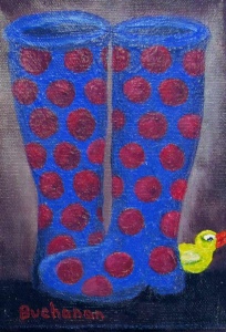 Blue rubber boots with red polka dots.
