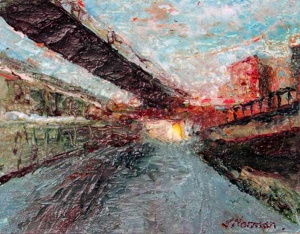 City scape showing a possible light rail above the receding street at sunset.