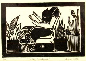 Woman reading among her potted plants.