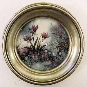 Round painting of pale magenta flowers.
