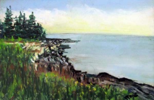 Green semi-wooded cliffside overlooking a calm blue sea under a bright sky.