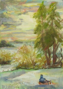 Small seated person viewing trees and lake under a pastel colored sky.