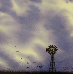Sprawling purple gray cloudy sky looming over a farmers wooden windmill.