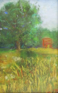 Rural filed with a large tree and old red barn.