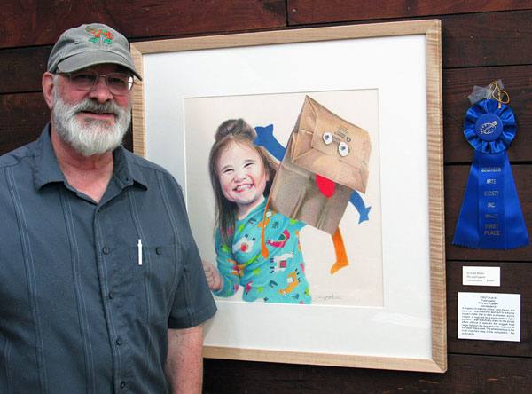 Todd Baxter with his first place winning artwork at Southern Arts Society reception.