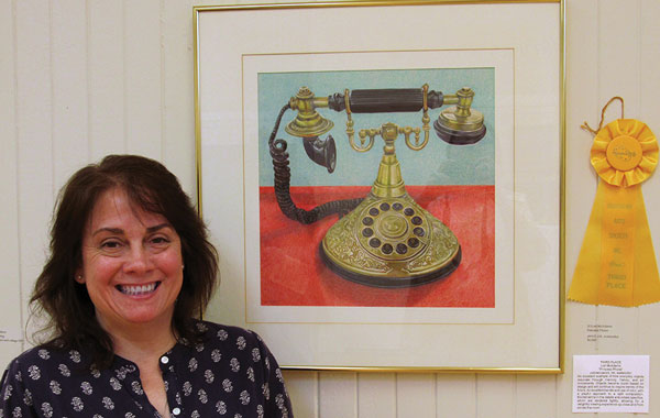 Lori McAdams and her third place winning artwork at Southern Arts Society reception.