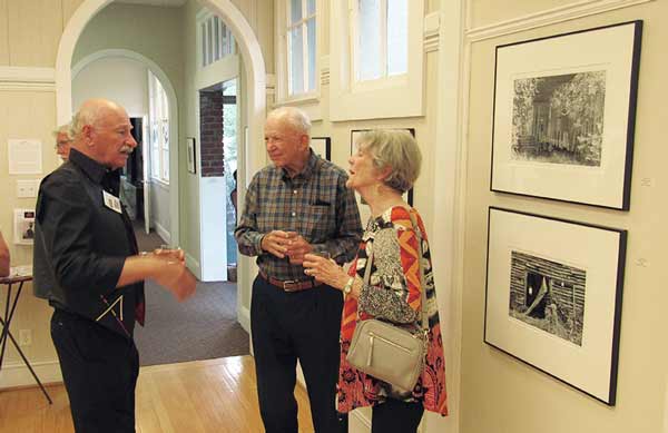 Alex Pietersen greeting guests at the Reavis Galley of Southern Arts Society
