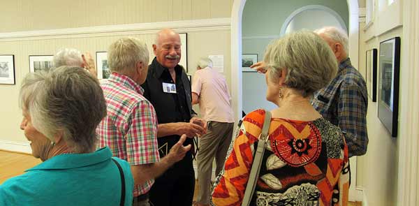 Alex Pietersen greeting guests at the Reavis Galley of Southern Arts Society