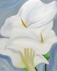 a hand holding 3 large white blooms with yellow centers against a gray background