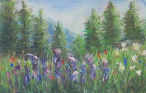 pine trees in the distance with red and purple flowers in the forefront of a wooded clearing