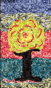 a bright green tree against a vibrant color banded backgroung rendered in thick crochet yarns.