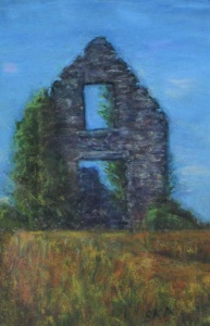the remainingwindow and door in an old barn with trees climbing its stone falling apart in a field.