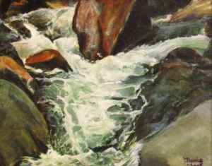 water rushing down along rocks.