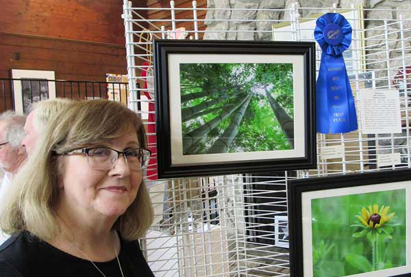 Ellen Devenny and her photo of a large growth of green bamboo: Bamboo Forest