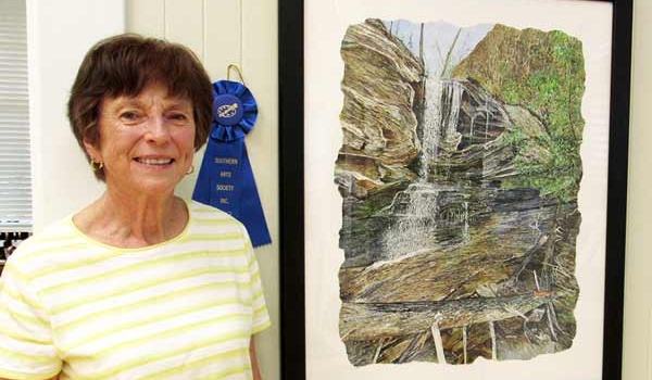 Martha Moore with her artwork , Hanging Rock State Park, watercolor