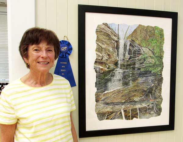 Martha Moore with her artwork , Hanging Rock State Park, watercolor