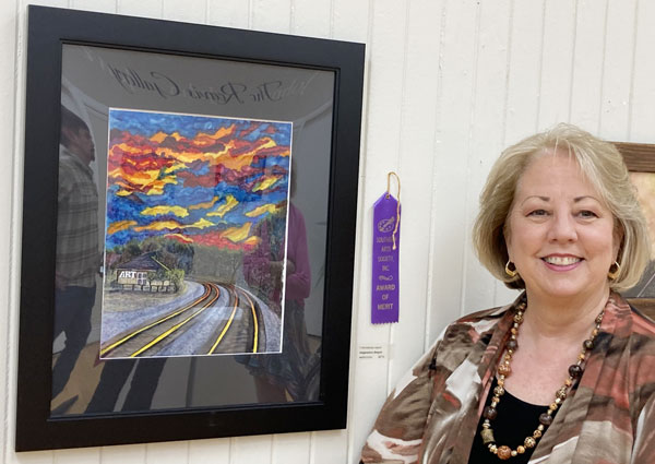 Kimberly Joyce with her merit award.