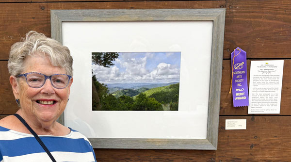 photographer Pat Pietersen with her merit award artwork.