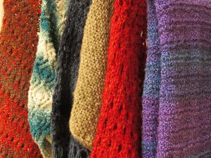 multicolored knitwear in southern arts society gift shop