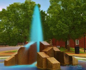 multicolored fountain with modern sculpture photography