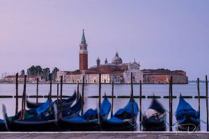 seascape of Venice behind gondolas photography