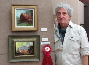 James L Norman with his 2nd Place oil painting